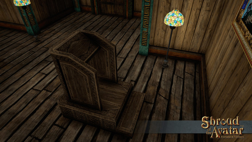 A fancy carved wooden podium sits ready in a Norgard hall.  Step right up: it can act as a book display stand!