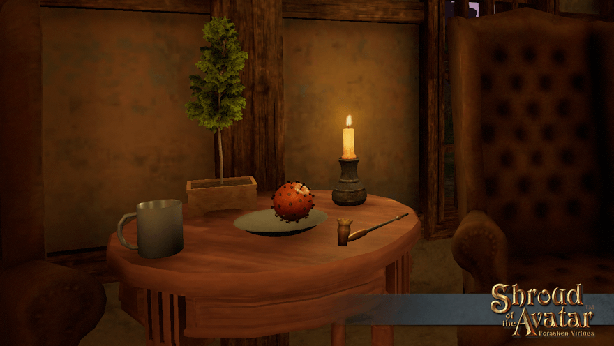 A cloved orange pomander, otherwise undecorated, sits on a pewter plate on a table between armchairs, accompanied by a candle, a mug, and a pipe.