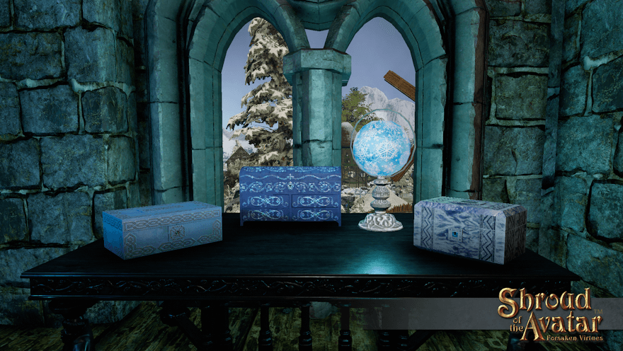 Three different blue jewelry boxes sit in front of a stone window with a view of Vertas.