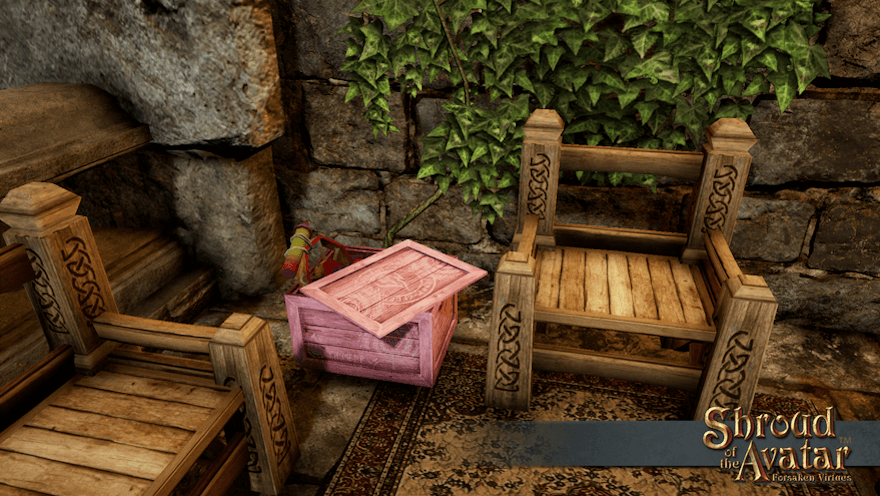 A light pink crate of pinwheel fireworks sits between heavy wooden chairs on a sunny stone balcony. Maybe wait 'til it's a bit darker.