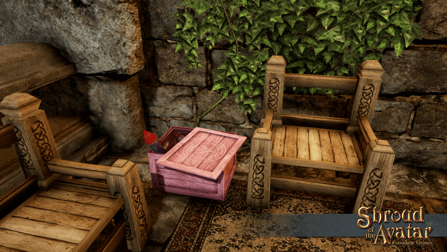 A light pink crate of rocket fireworks sits between heavy wooden chairs on a sunny stone balcony. Designated firework-handler is like designated driver.