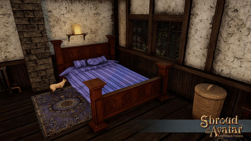 A dark wooden bed with ornamental carved panels and a striped purplish-blue duvet and pillows is about to be jumped on by a siamese cat.