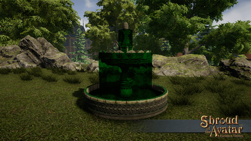 A two-layer stone fountain is covered in dark moss and the water is emerald green.