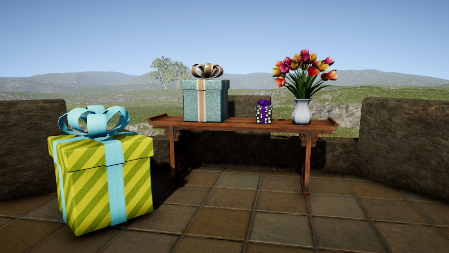 A celestian altar table on a roof deck overlooking rolling hills holds a small black and white gift box with a purple ribbon, a medium sparkly blue gift box with a peach ribbon, and a vase of tulips. A large yellow striped gift box with a pale blue ribbon sits on the floor next to it.