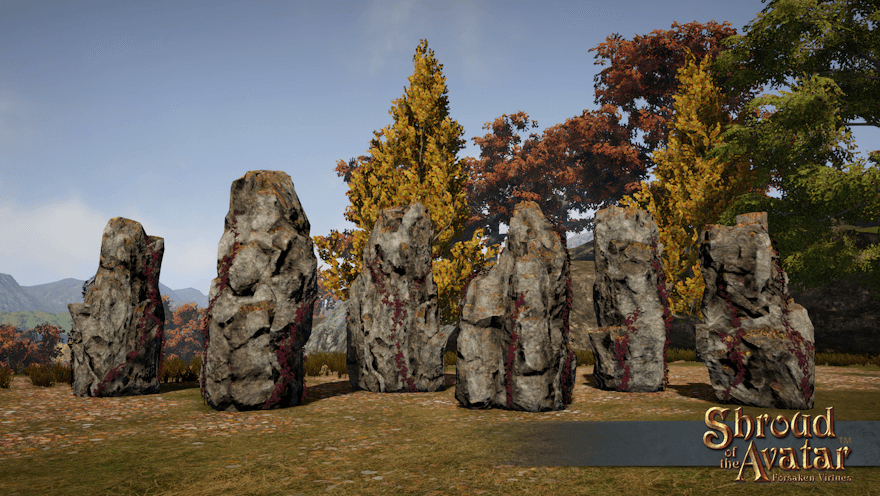 Six large stones, covered in leaf litter and red ivy, stand high in Harvest among autumn trees.