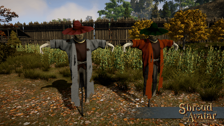 Two scarecrows have been placed in front of a cornfield in Harvest.  One has a grey coat and a red hat and the other has an orange coat with a green hat.  It must want to be a pumpkin.